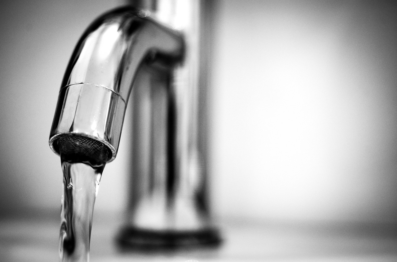 Clean water coming out of a faucet