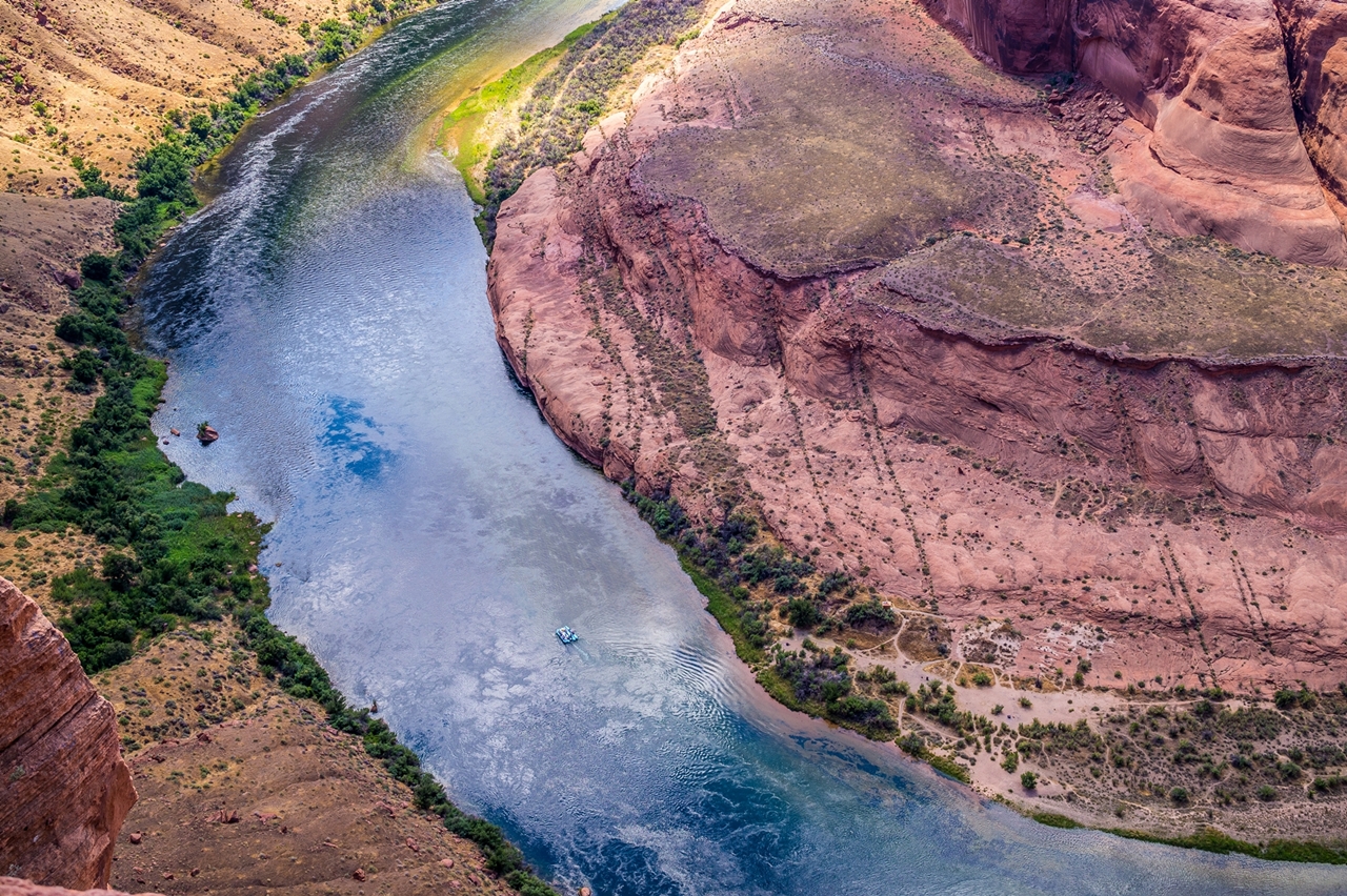 The Colorado River, reflecting the blue sky above