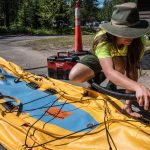 A boat inspection for aquatic invasive species like the golden mussel
