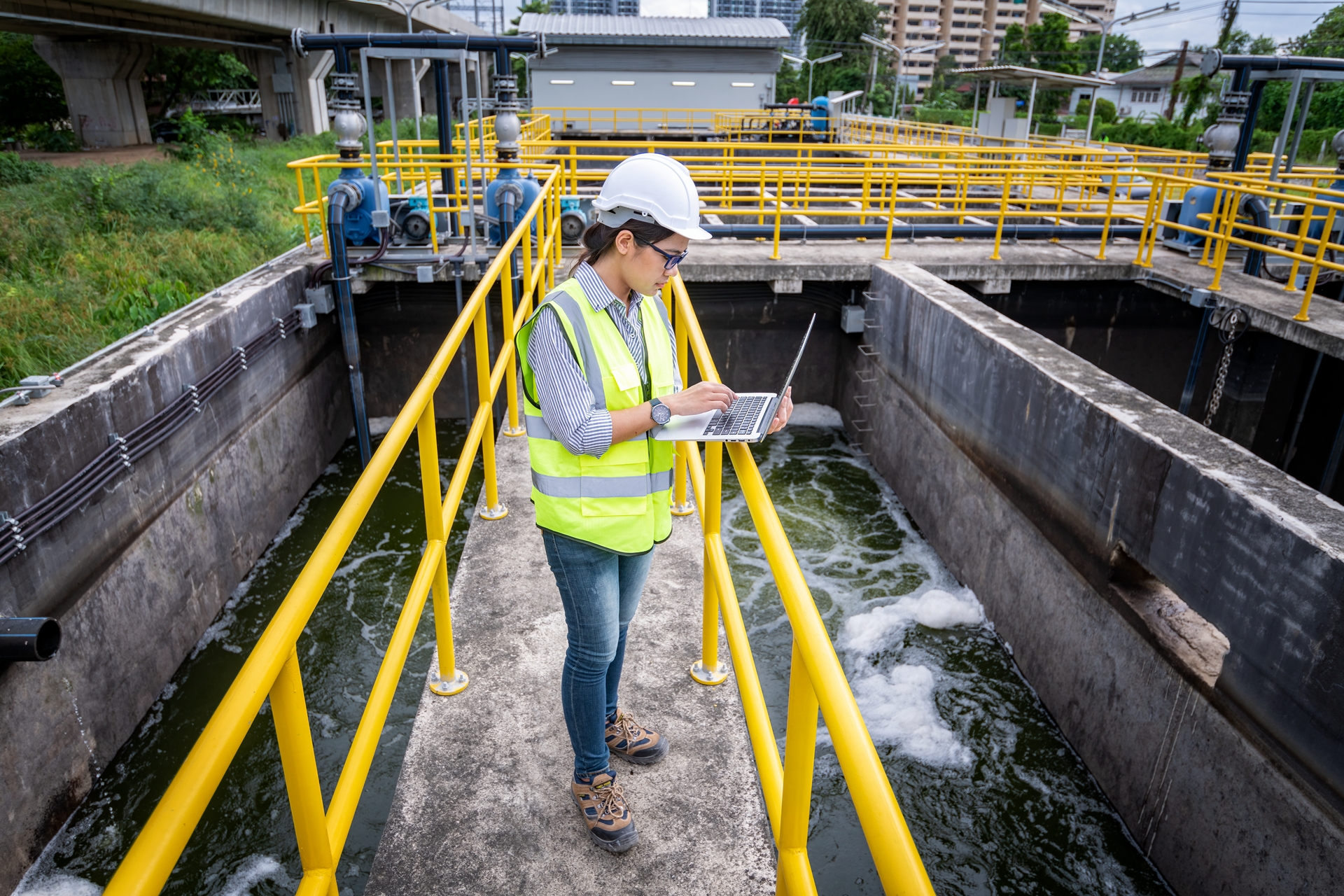 An engineer tests wastewater treatment
