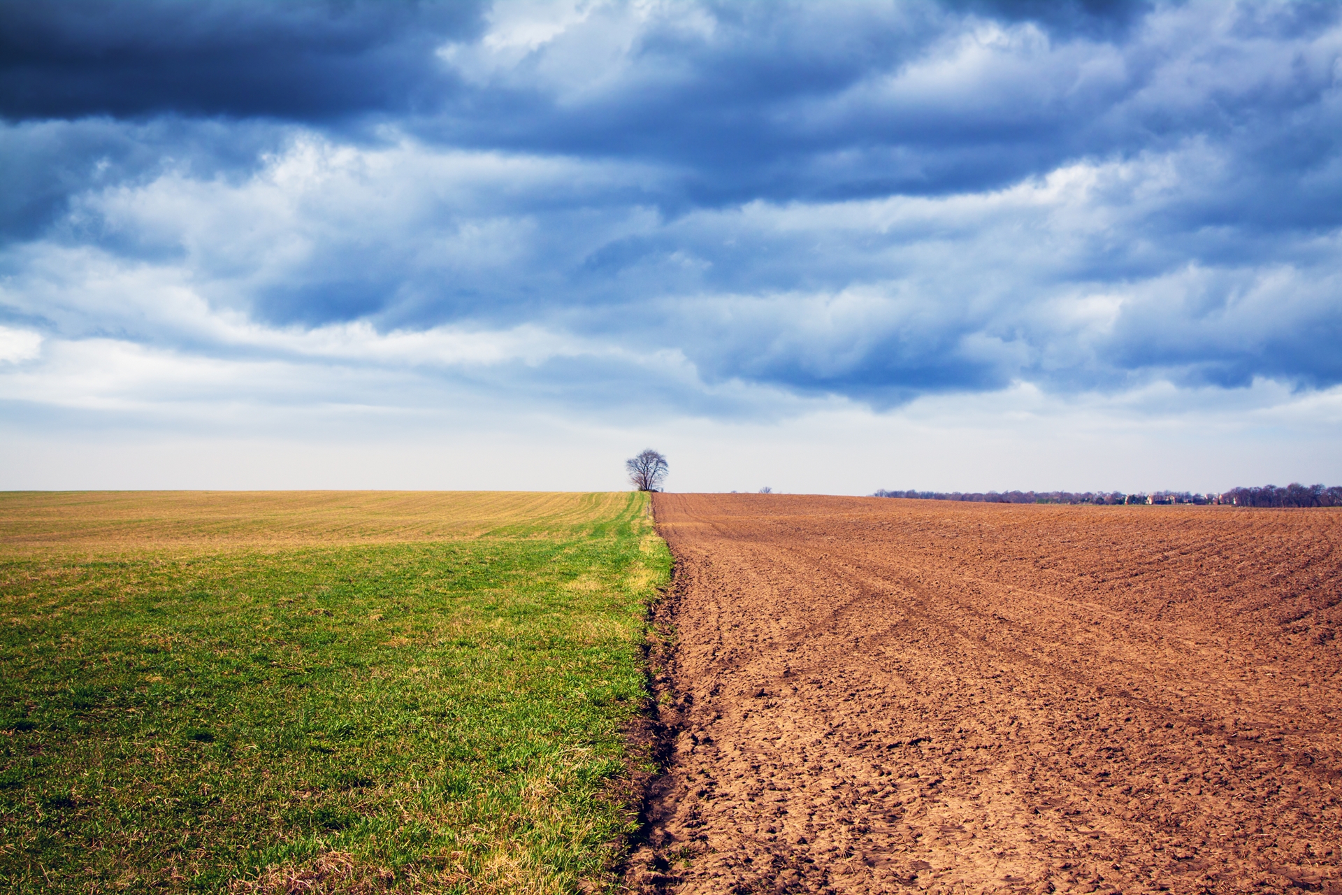 Dramatic sky over rural farmland to reflect climate concepts